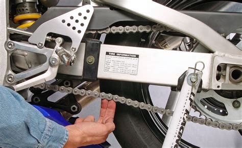 How to Tighten Chain on Motorcycle: A Comprehensive Guide and the Art of Balancing Tension